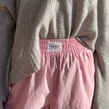 Pantalon rose en popeline, large et confortable, zoom ceinture.