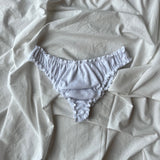 Tanga, culotte en jersey pointelle blanc posé